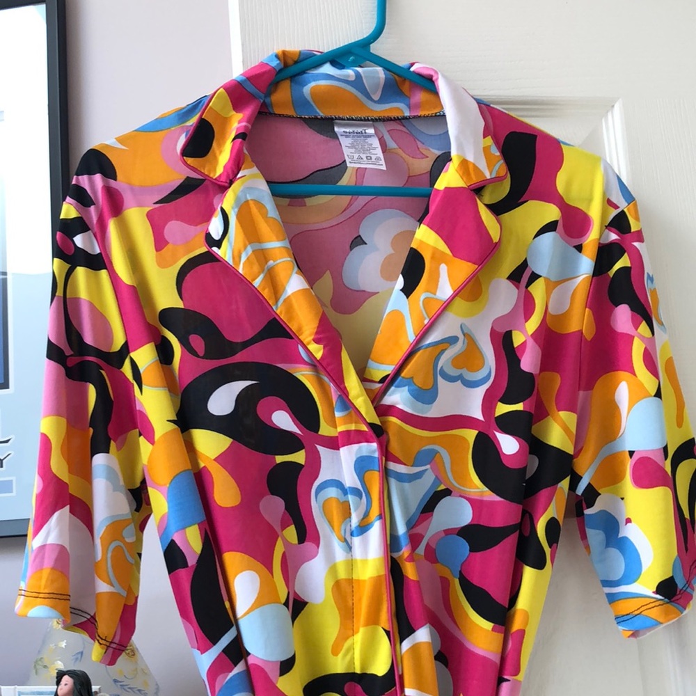 NWOT “Spirit Halloween” jumpsuit ,size small, disco style V neck w/ button& belt